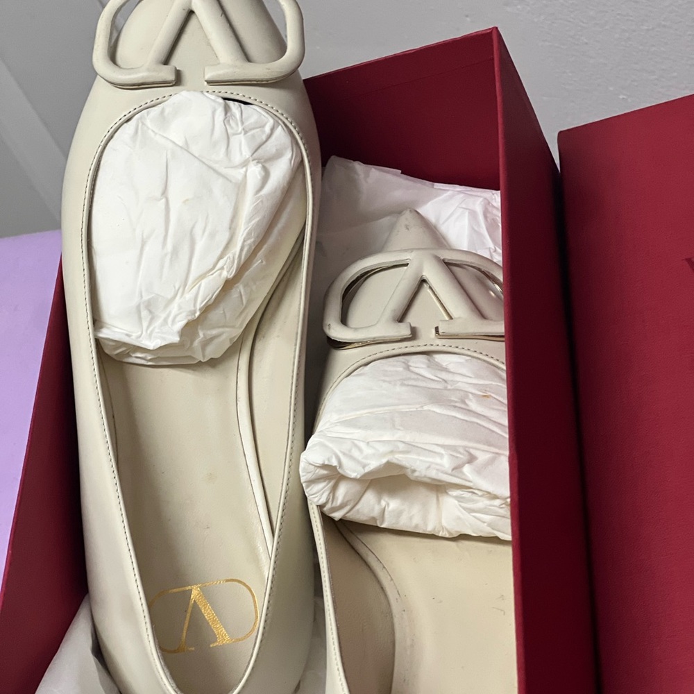 Valentino Cream Flats with Minimalist Design